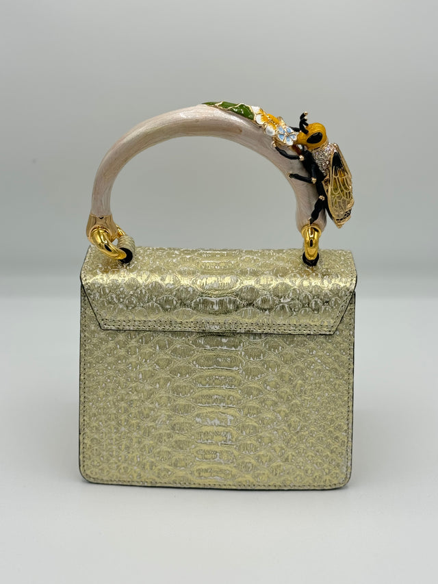 Gold Metallic Python handbag with hand-painted bee enamelled brass handle