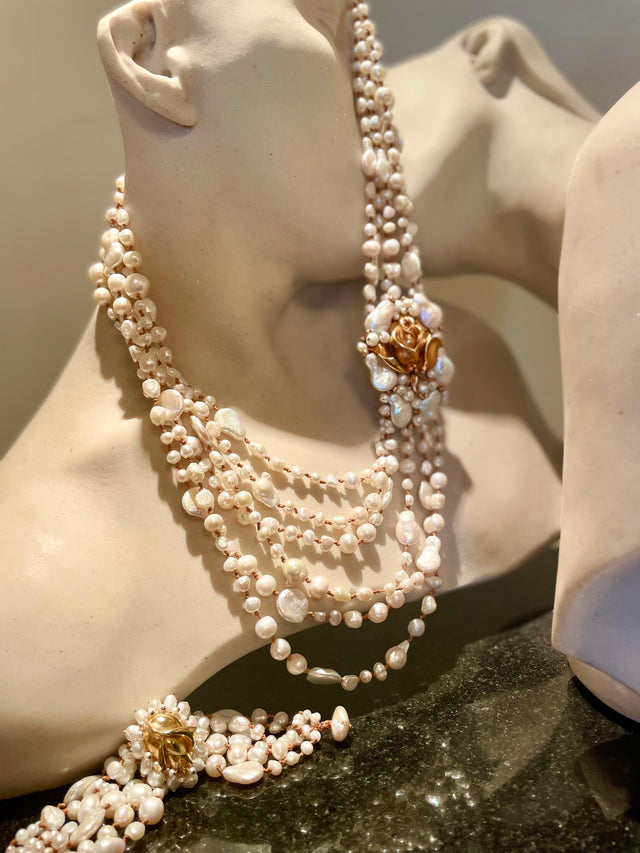 Pearl crochet bracelet with brass medallion