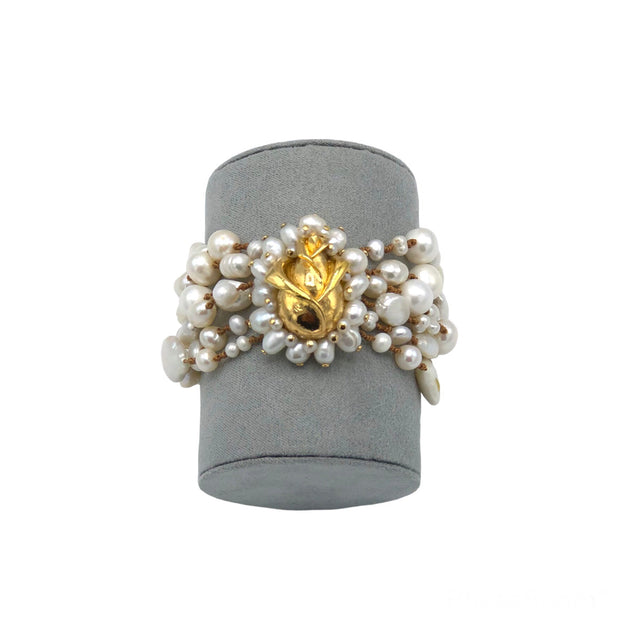Pearl crochet bracelet with brass medallion