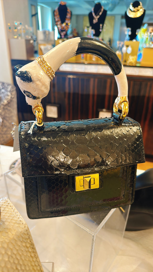 Black python handbag with hand-painted panda enamelled brass handle