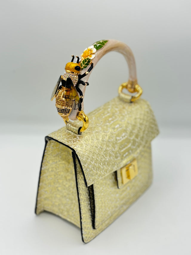 Gold Metallic Python handbag with hand-painted bee enamelled brass handle