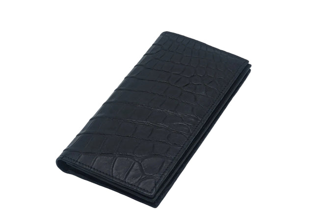 Black crocodile-patterned wallet on a light gray background