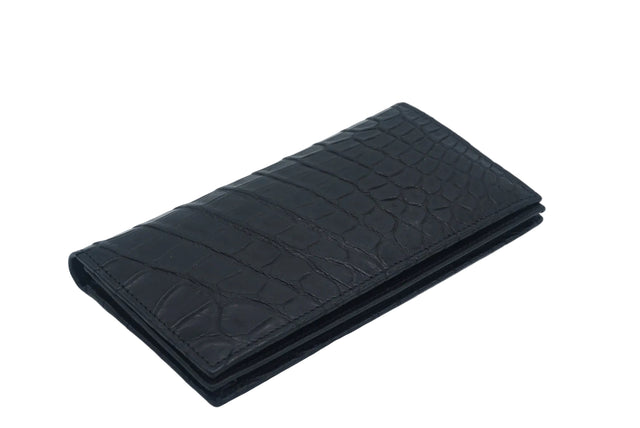 Black crocodile-patterned wallet on a light gray background