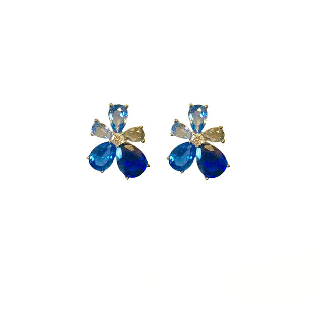 Petite blue asymmetrical flower stud earrings