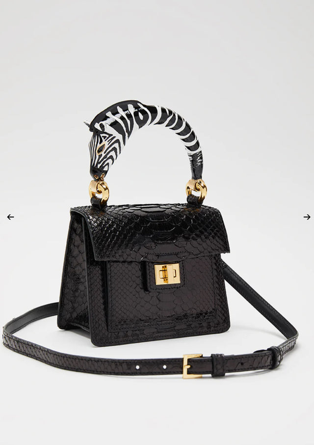 Python top handle bag with black zebra handle charm