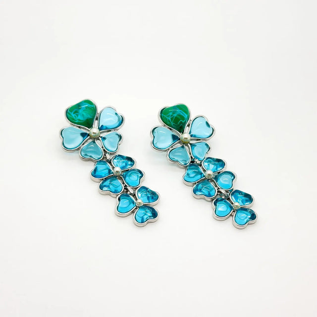 Four-leaf clover clip earrings in Sapphire Blue Boho